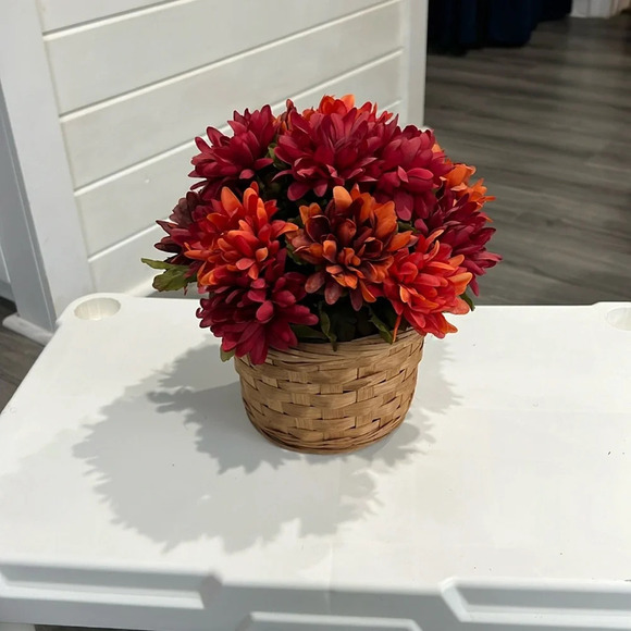 Rust colored floral arrangement in basket - Picture 1 of 3
